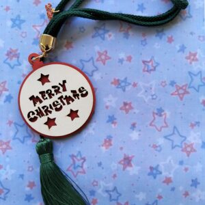 Γούρι ξύλινο Merry Christmas με πράσινο κορδόνι